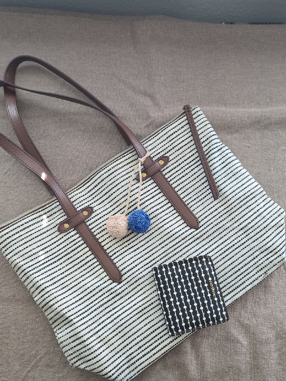 Fossil Striped Canvas Tote with Brown Leather Handles and Pom Pom Charms